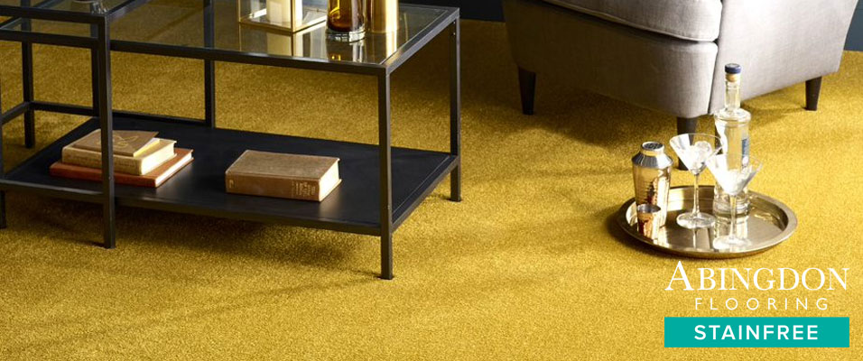 Our range 'Caress' in a stunning golden colour, showing a living room shot