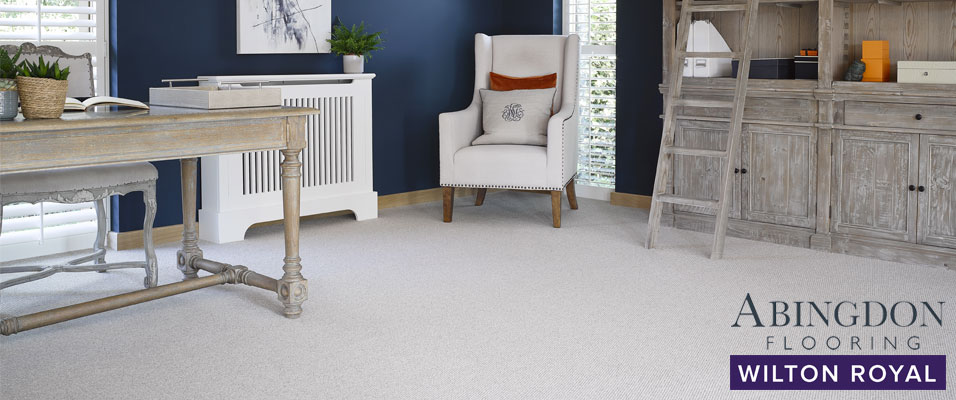 A white loop carpet made from 100% wool in a study